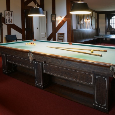 Billiard with racked balls